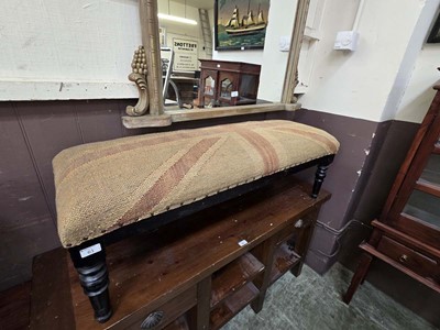 Lot 61 - A black painted overstuffed seated long stool
