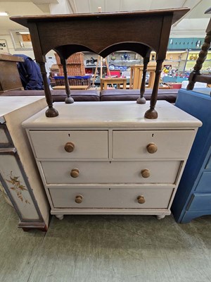 Lot 67 - A cream painted pine chest of two short over...