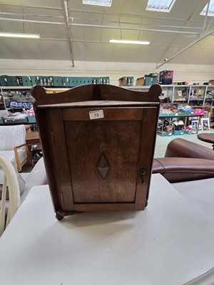 Lot 73 - A small wall mounted corner cupboard with...