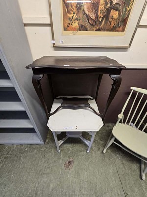 Lot 75 - A white painted occasional table with under tier
