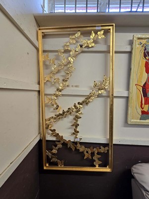 Lot 121 - A framed gilt painted metalwork art work with...