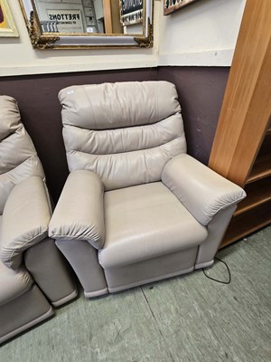 Lot 124 - A mushroom leather reclining chair of high...