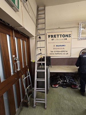 Lot 136 - A set of extending ladders each ladder having...