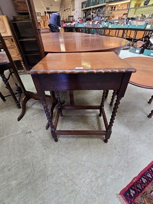 Lot 84 - A mid 20th century oak occasional table with...