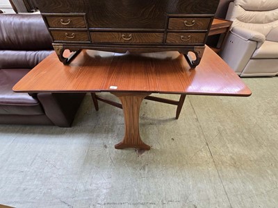 Lot 92 - A mid 20th century teak drop leaf table
