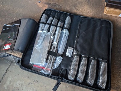 Lot 573 - 9 piece Samurai Japanese style knife set in...