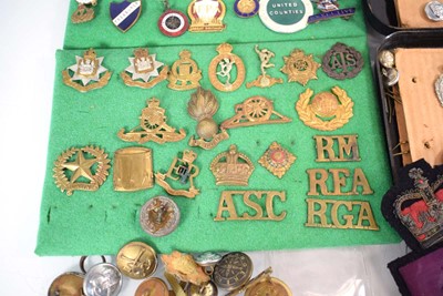 Lot 108 - A collection of buttons, badges, belt buckles,...