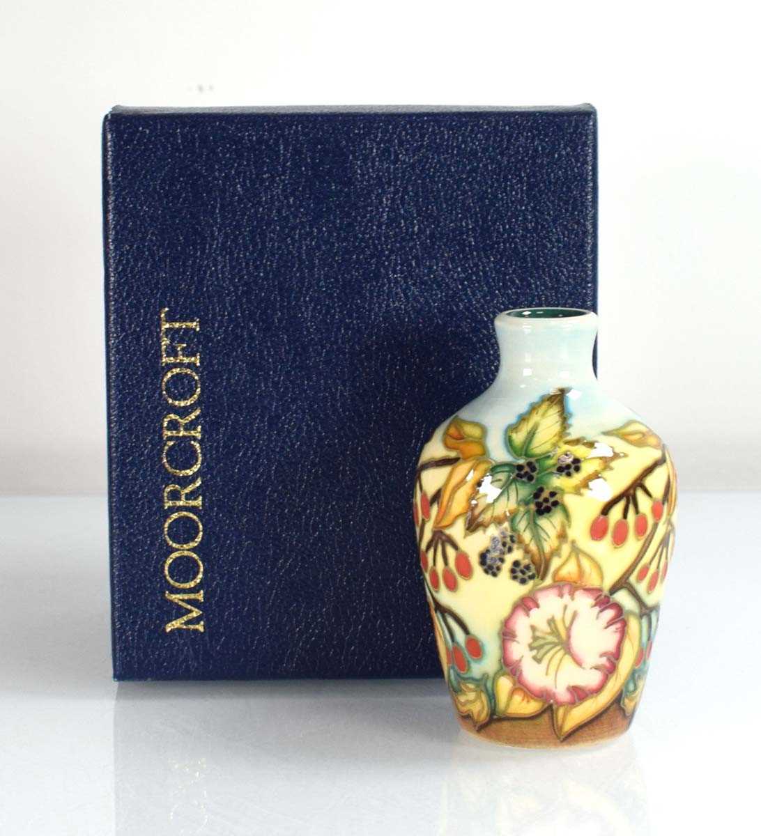Lot 260 - A miniature Moorcroft vase of shouldered form...