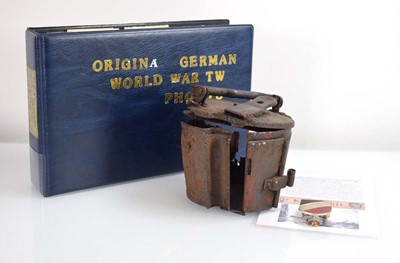 Lot 84 - A album of Second World War photographs of...