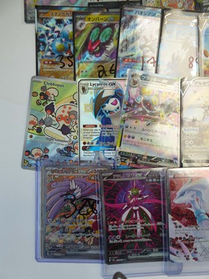 Lot Qty of top loaded/sleeved Pokémon cards from...