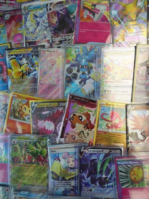 Lot Qty of top loaded/sleeved Pokémon cards from...