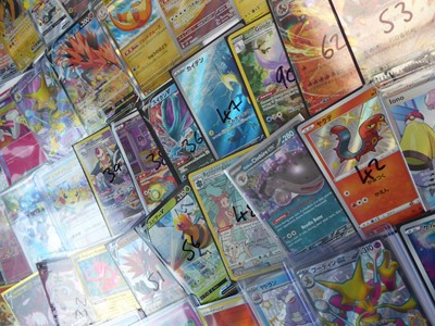 Lot Qty of top loaded/sleeved Pokémon cards from...