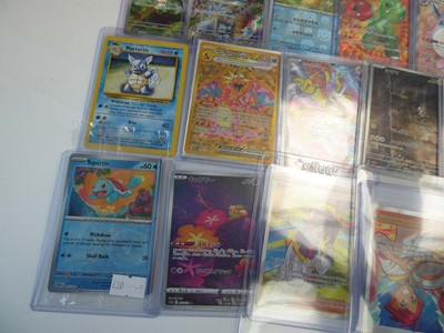Lot Qty of top loaded/sleeved Pokémon cards from...
