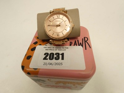 Lot 2031 - Fossil wristwatch with tin