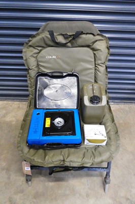 Lot JRC green upholstered fishing chair with Chub...