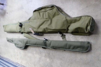 Lot Trakker fishing rod bag with 1 other green...