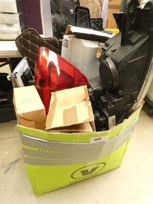 Lot 4606 - Large box of spare car parts including front...