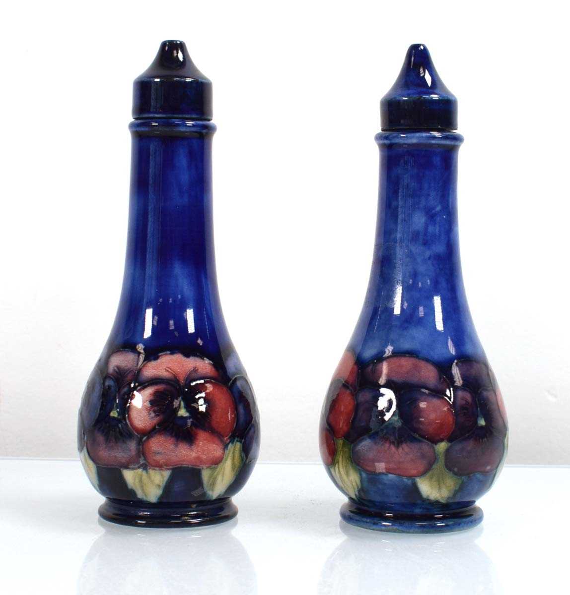 Lot 250 - A pair of Moorcroft cruets of slender form...