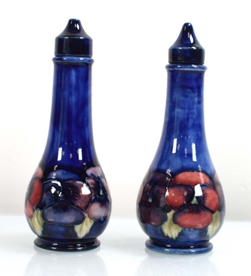 Lot 250 - A pair of Moorcroft cruets of slender form...
