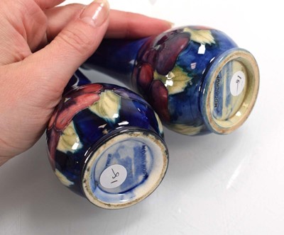 Lot 250 - A pair of Moorcroft cruets of slender form...
