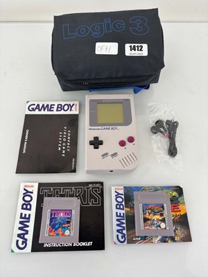 Lot GameBoy with 2x games, headphones and Logic3...