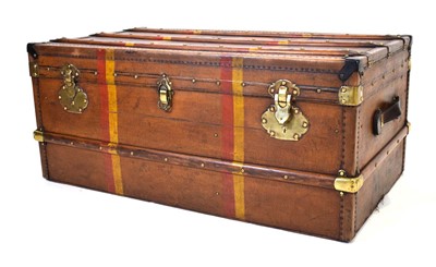 Lot 8 - A canvas travel trunk with beech banding and...