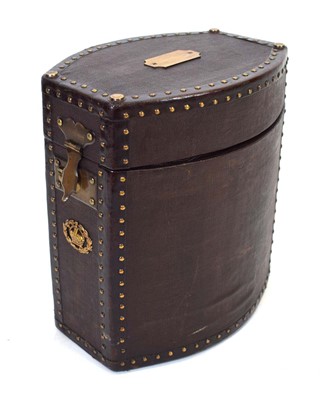Lot 14 - A canvas leather hat box with brass fittings,...