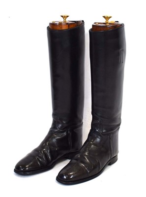 Lot 15 - A pair of black leather riding boots and trees,...
