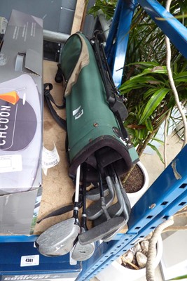 Lot 4346 - Green canvas golf bag containing clubs by...