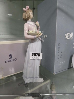 Lot 2076 - Lladro lady with some flowers