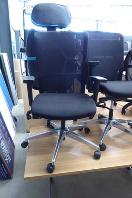 Lot 4453 - Fabric upholstered black swivel office...