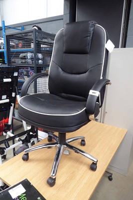 Lot 4457 - Black leatherette upholstered swivel office...