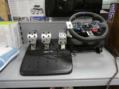 Lot 2186 - Logitech steering wheel and pedals for...