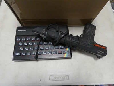 Lot 2215 - Sinclair ZX Spectrum along with light gun,...