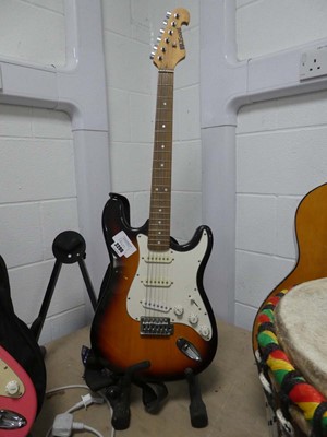 Lot 2296 - Starsound 6 string electric guitar in brown...