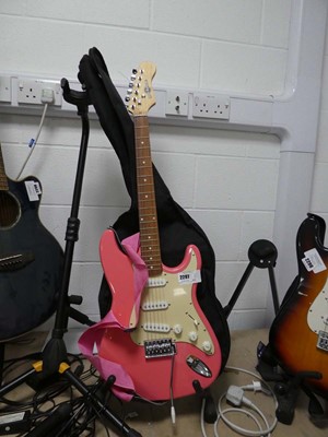 Lot 2297 - Gear4music 6 string electric guitar in pink...