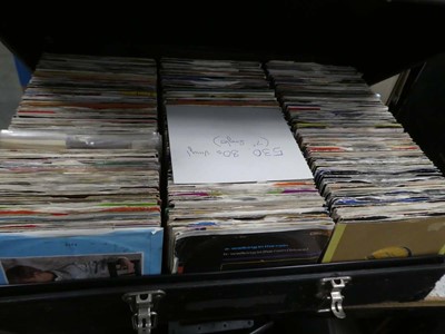 Lot 2477 - Case containing 1980s 7 inch vinyl singles