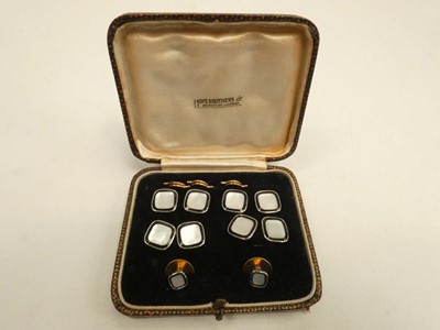 Lot 2068 - Set of mother-of-pearl dress studs and...