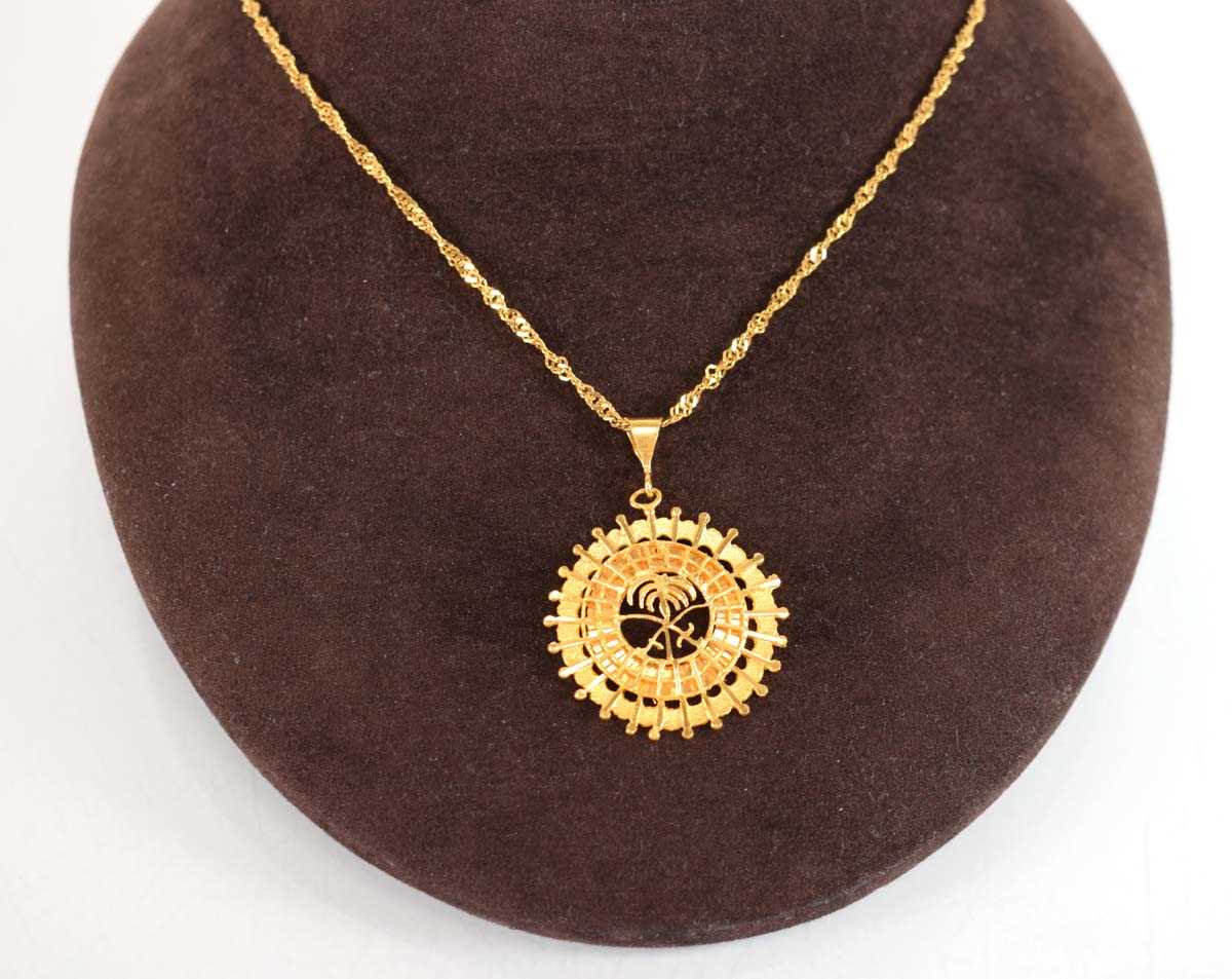 Lot 502 - A Middle Eastern yellow metal ropetwist...