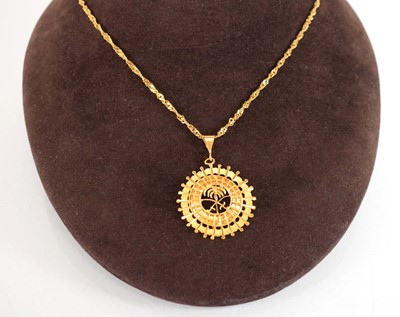 Lot 502 - A Middle Eastern yellow metal ropetwist...