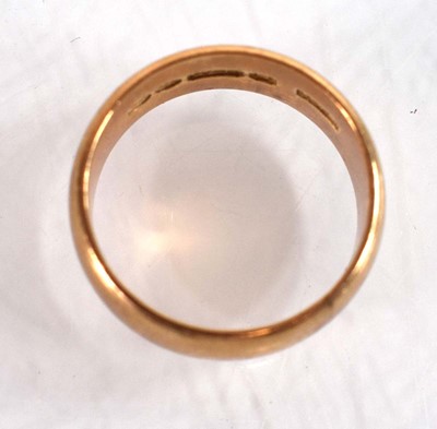 Lot 505 - A 9ct yellow gold wedding band, Birmingham...