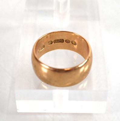 Lot 505 - A 9ct yellow gold wedding band, Birmingham...