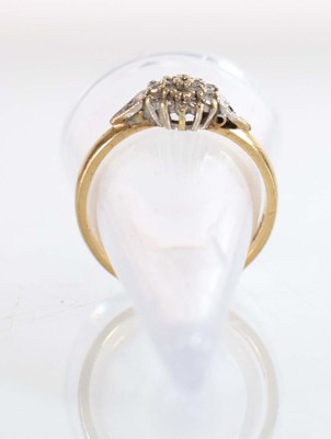 Lot 507 - A 9ct yellow gold cluster ring set small...
