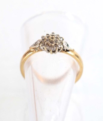 Lot 507 - A 9ct yellow gold cluster ring set small...