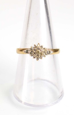Lot 507 - A 9ct yellow gold cluster ring set small...