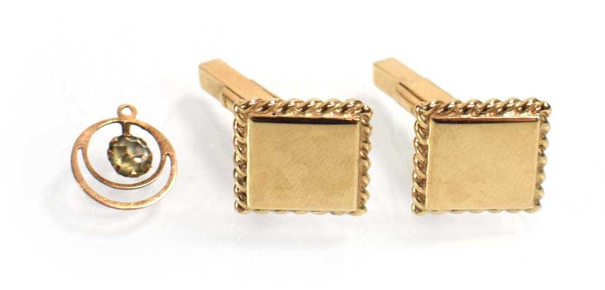 Lot 523 - A pair of 9ct yellow gold cufflinks of square...