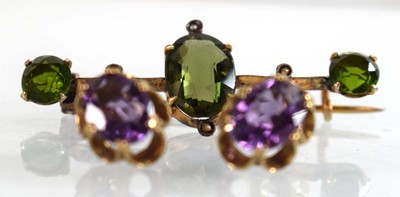 Lot 525 - A pair of 9ct yellow gold eat studs, each set...