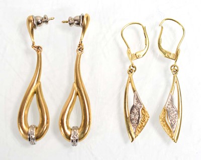 Lot 527 - A pair of yellow metal ear pendants, each set...