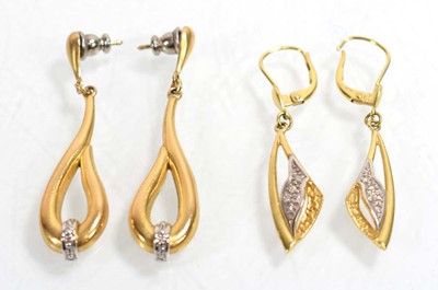 Lot 527 - A pair of yellow metal ear pendants, each set...