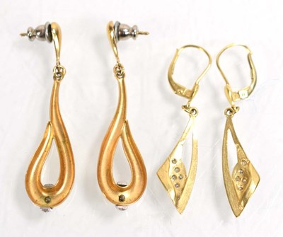 Lot 527 - A pair of yellow metal ear pendants, each set...